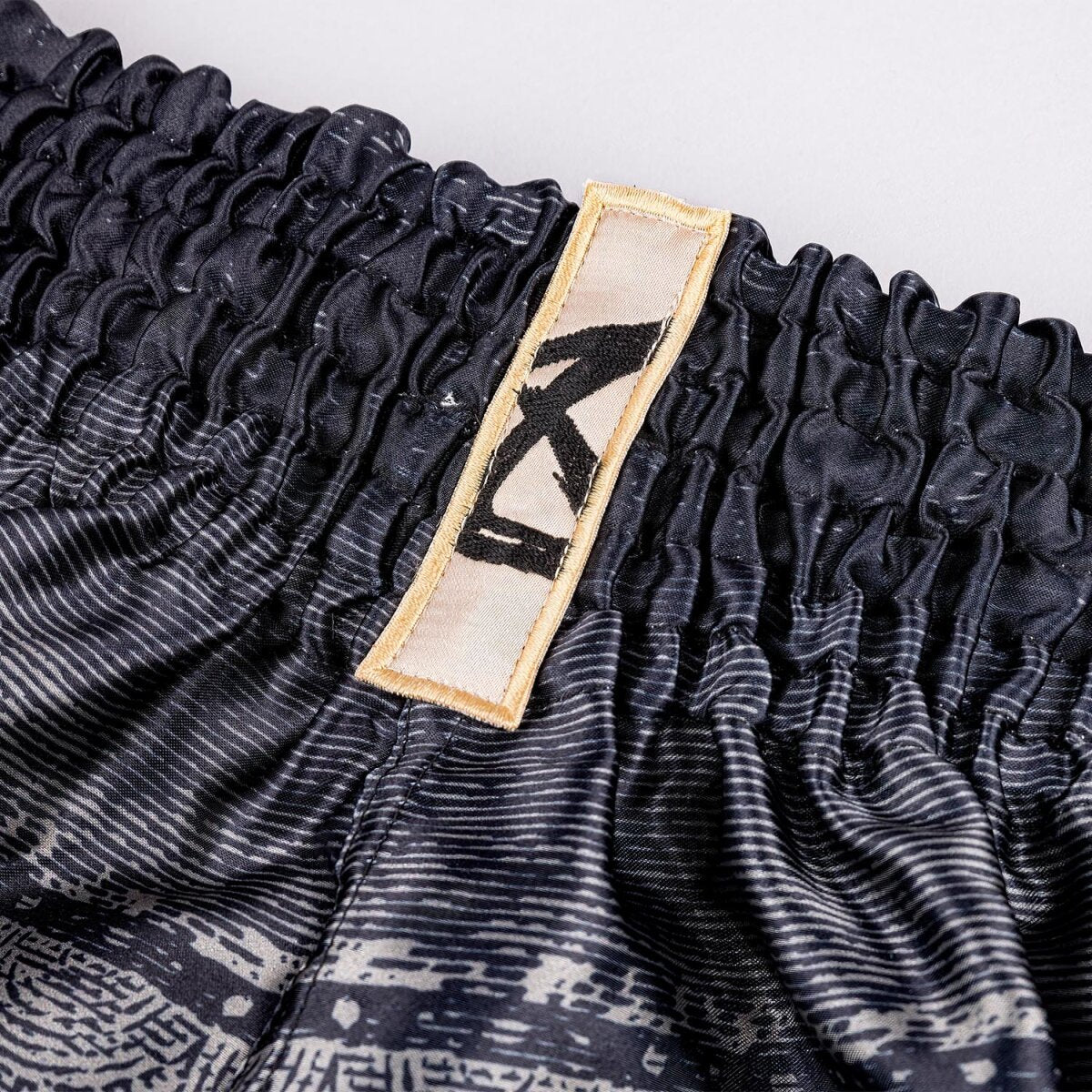 8 WEAPONS Muay Thai Shorts, Hanuman, black-gold