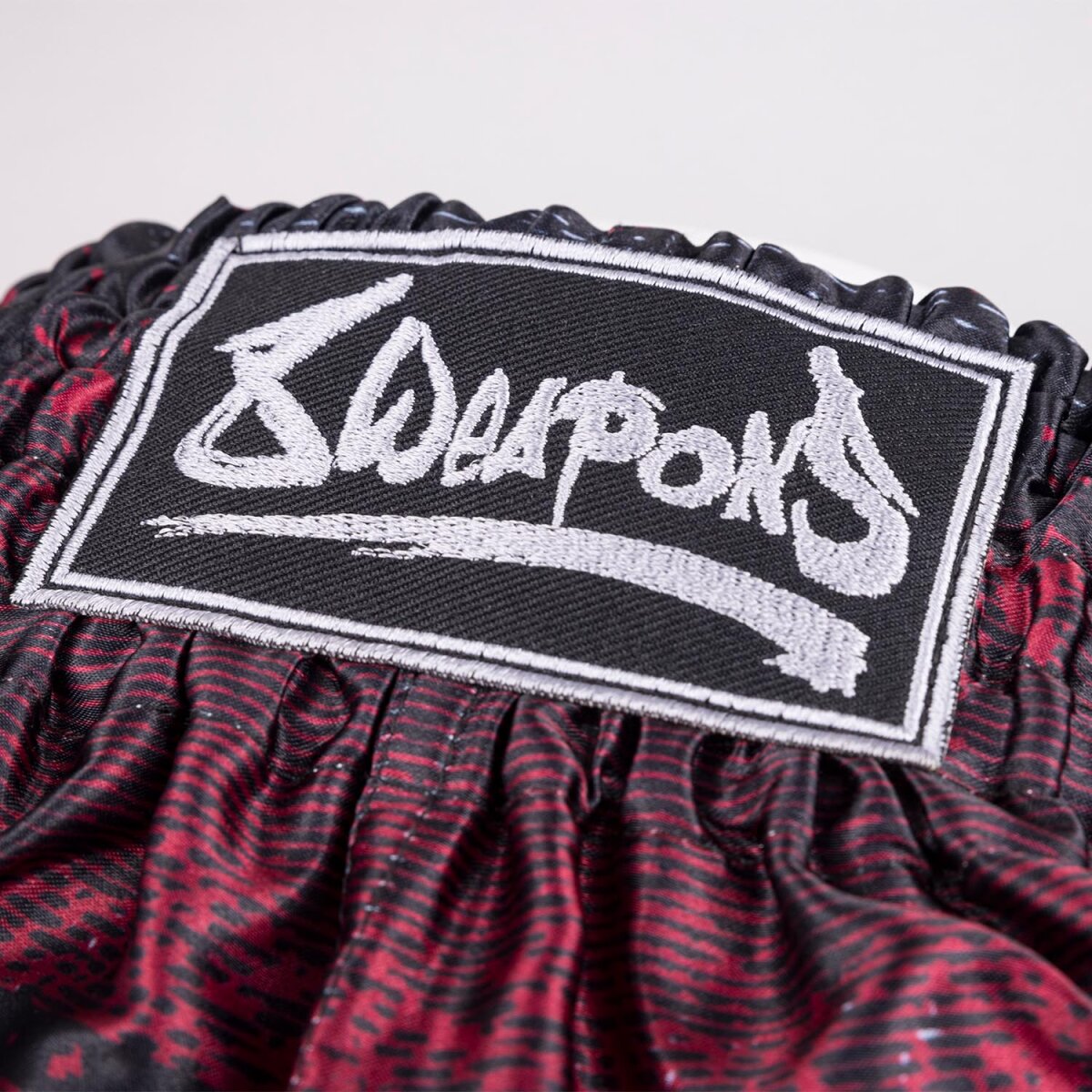 8 WEAPONS Muay Thai Shorts, Hanuman, black-red