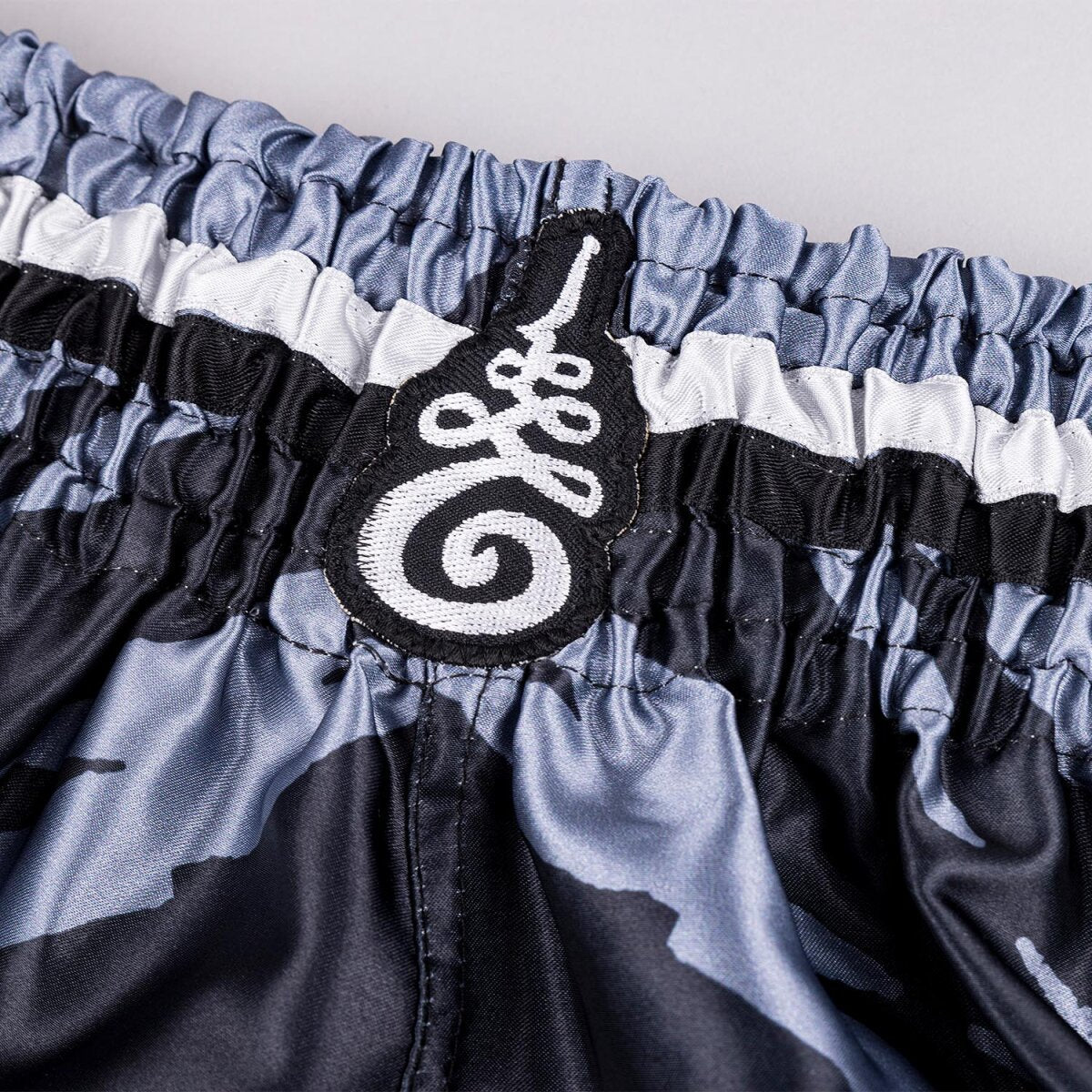 8 WEAPONS Muay Thai Shorts, 8 Ways Yant, black-silver