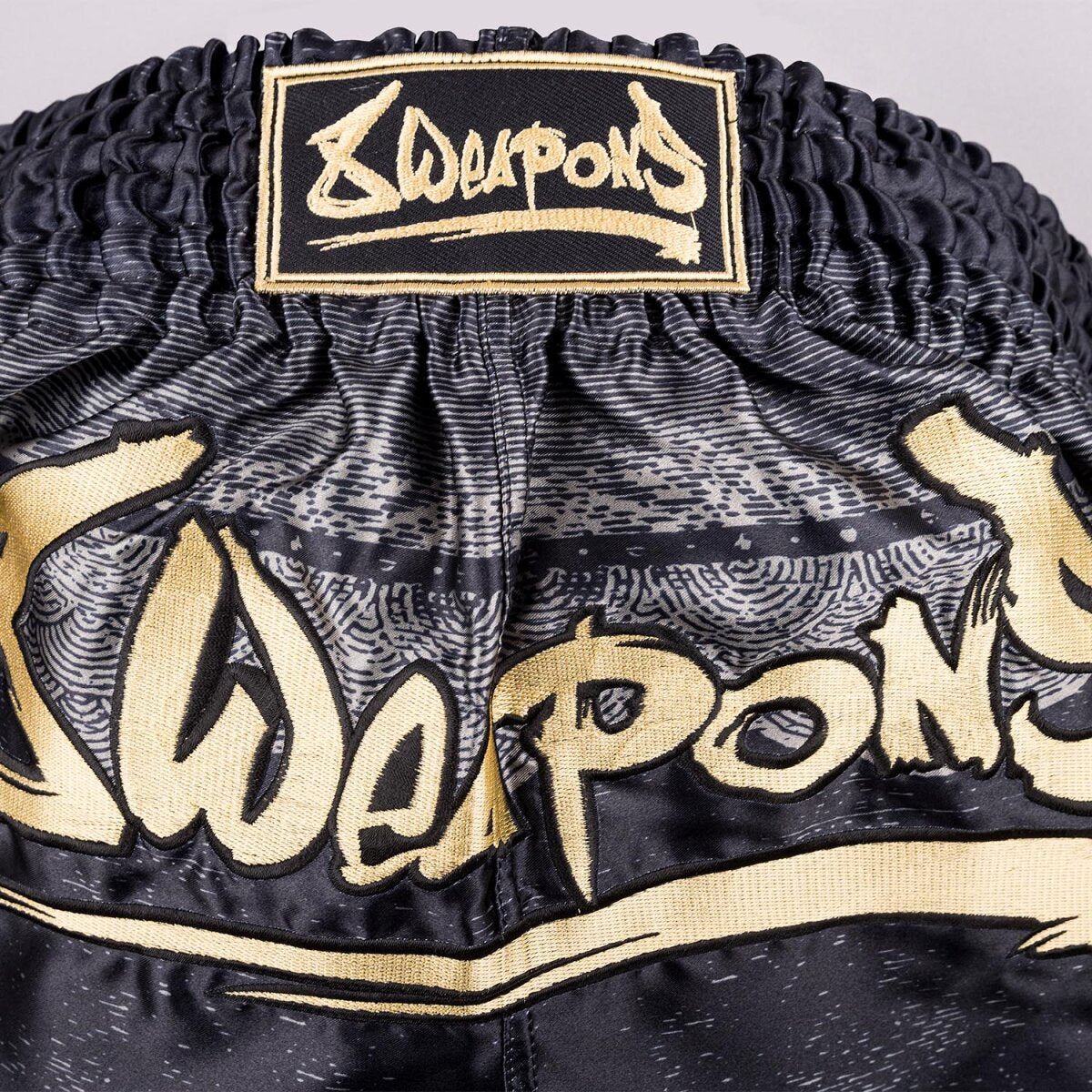 8 WEAPONS Muay Thai Shorts, Hanuman, black-gold